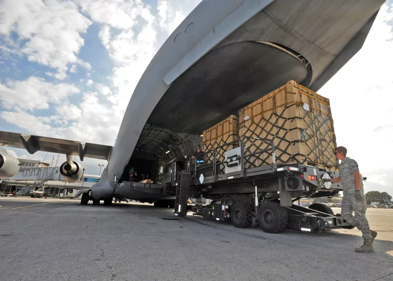 Loading up 463L Pallets on Military Cargo Plane - GSA Contractor